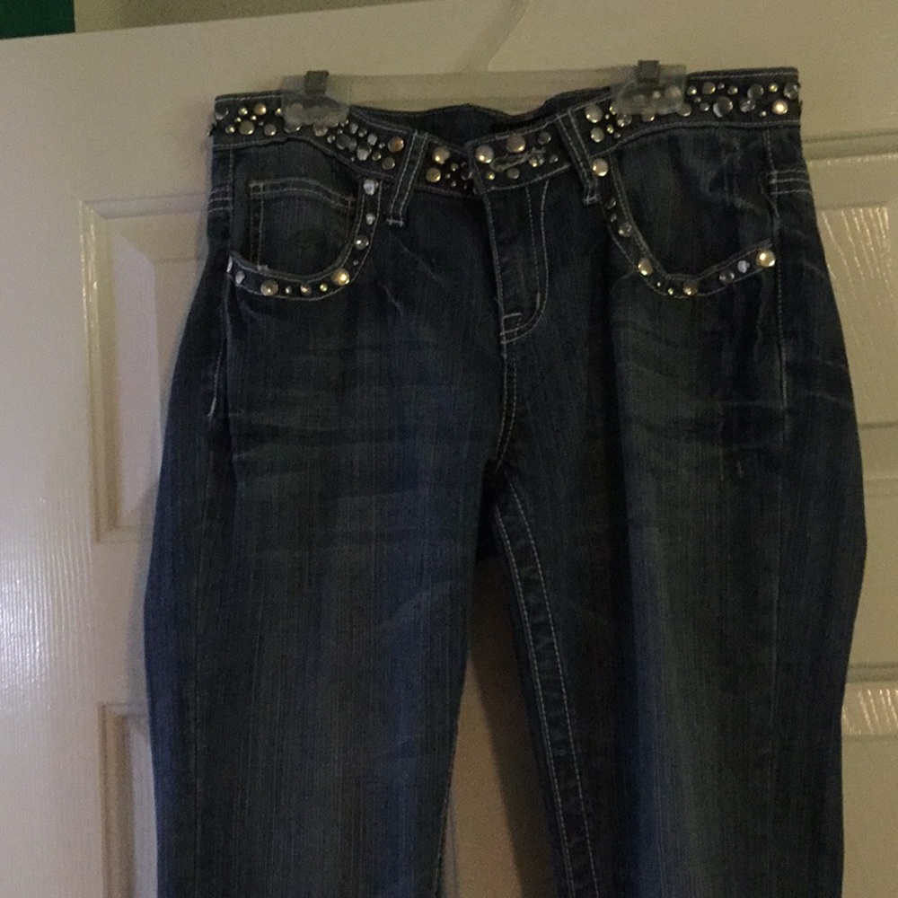 Silver studded blue jeans size 4, like new!